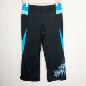 LULULEMON | Black & Turquoise Flare Capri Leggings Flower Graphic Women’s Size 4